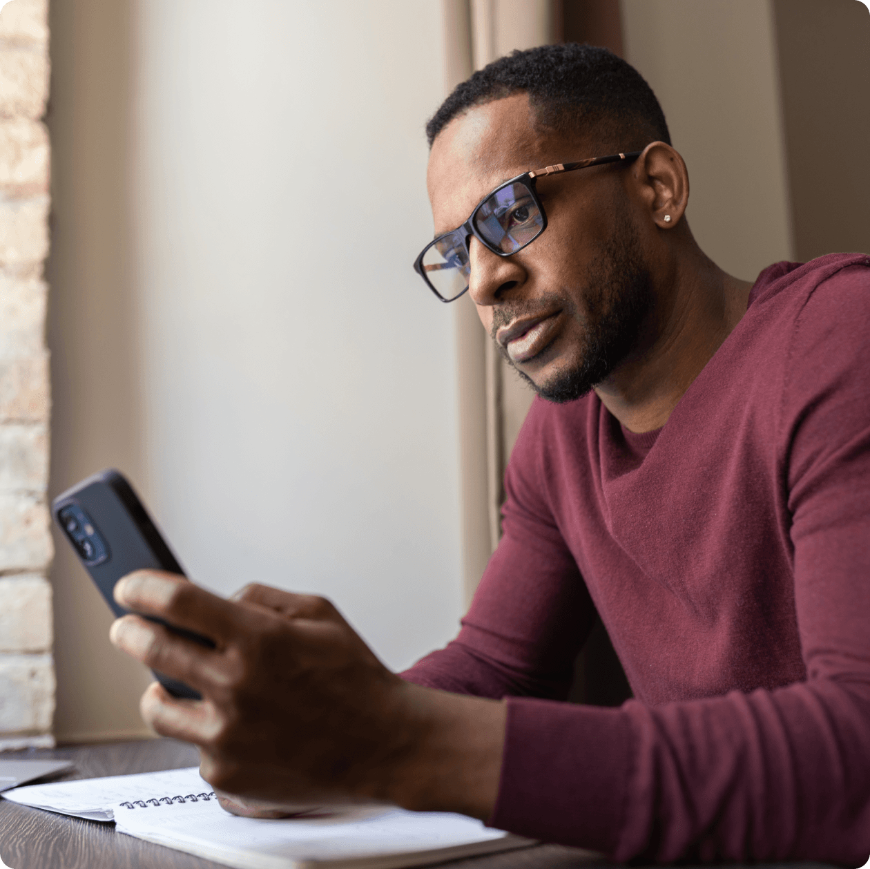 Man on phone identifying the best next cash and treasury management opportunities